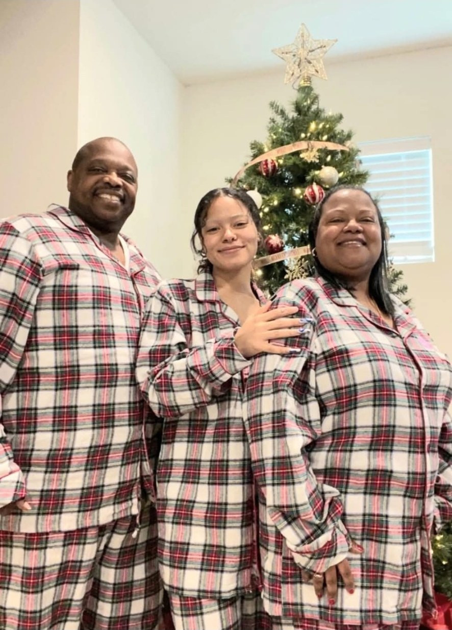Will with his family dressed up for the holidays